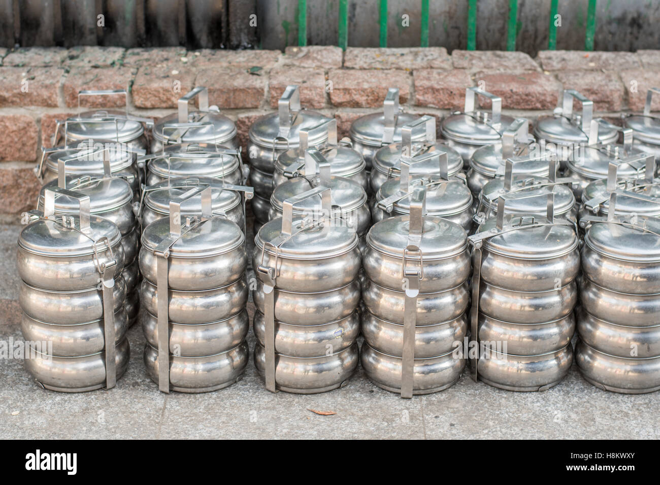 Cairo, Egypt. Close up of silver stacked lunch pales for sale in the outdoor bazaar/ flea market Khan el-Khalili in Cairo. Stock Photo