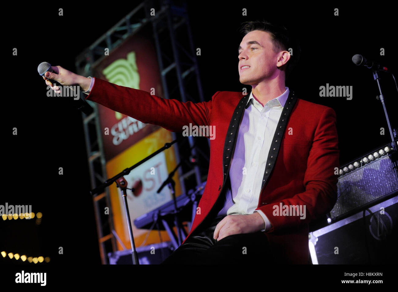 Jesse McCartney performs at the Citadel Outlets Christmas Tree Lighting and Concert on November 9, 2013 in Los Angeles California. Stock Photo
