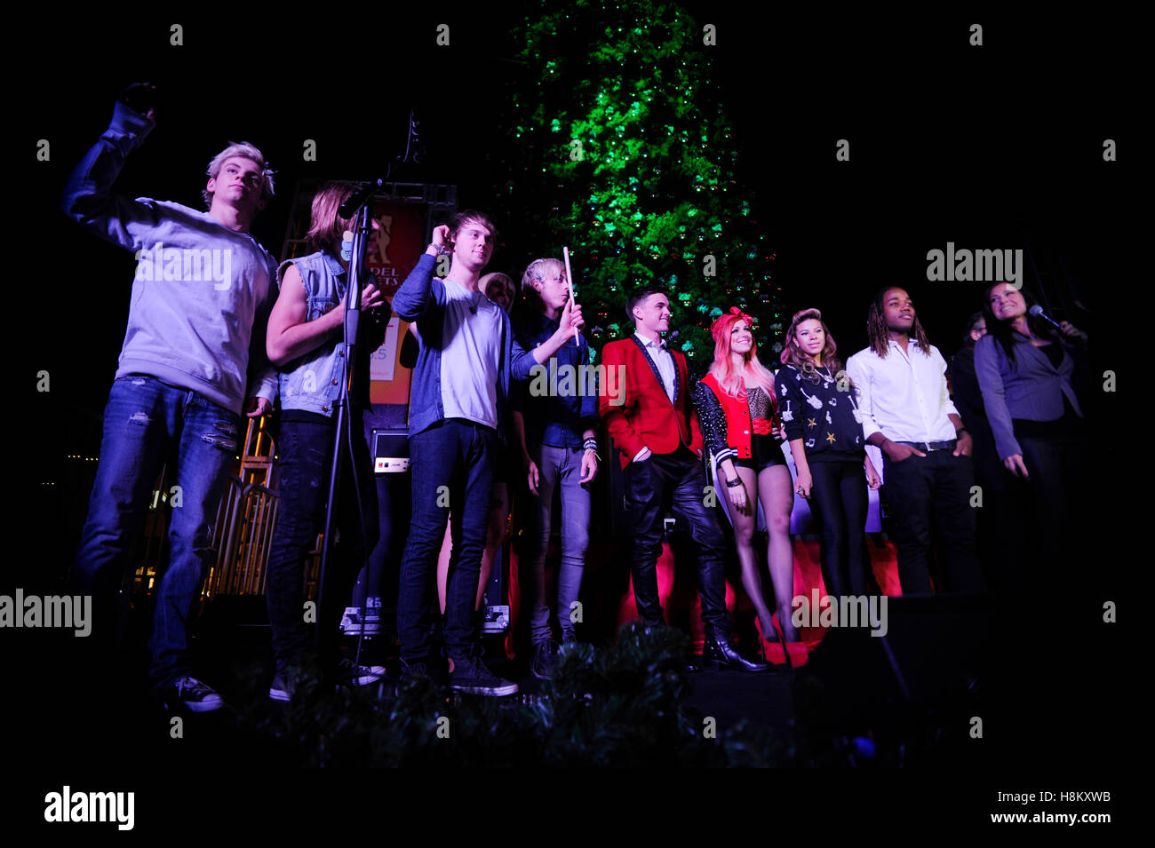(L-R) Ross Lynch, R5, Jesse McCartney (c), Bonnie McKee and Leon Thomas (r) onstage at the Citadel Outlets Christmas Tree Lighting and Concert on November 9, 2013 in Los Angeles California. at the Citadel Outlets Christmas Tree Lighting and Concert on Nov Stock Photo