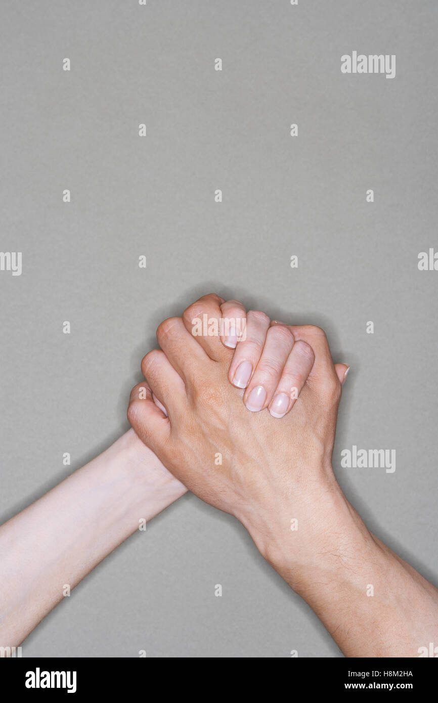 Two friends holding hands hi-res stock photography and images - Alamy