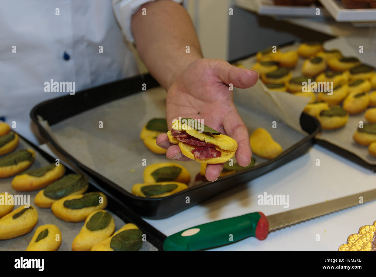 Preparation of Italian Deepfried Pizza Roll with Mints Leaf and filled