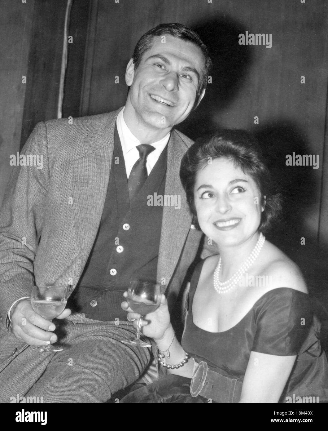 Italian actress Lea Padovani and American actor Sam Wanamaker, who are due to star in Tennesse Williams's The Rose Tattoo at the New Theatre, London. They are pictured at a reception for Miss Padovani at the Savoy Hotel. Sam is also producing the play. Stock Photo