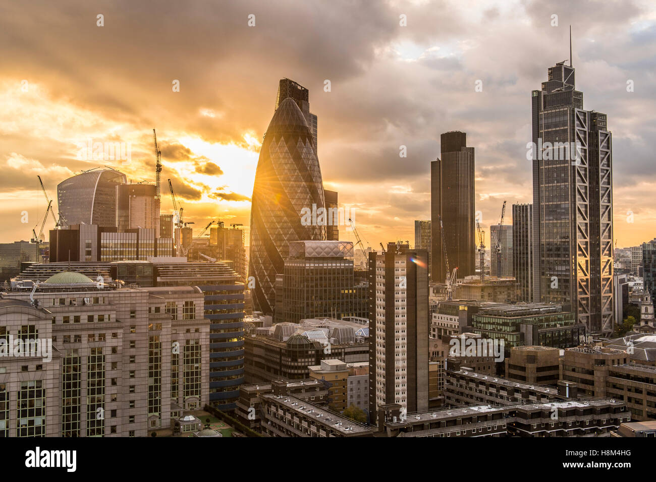 a London skyline, cityscape, high rise, skyscraper, the Gherkin, Tower 42, Heron Tower, night, dusk city, financial center Stock Photo