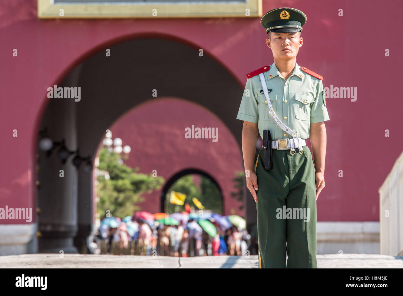Beijing China - A paramilitary policeman standing guard in front of the Meridian Gate (WuMen), the outside gate surrounding the  Stock Photo