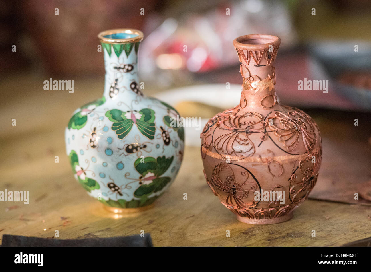 Beijing, China - Elaborately decorated CloisonnŽ vases, one painted and one unpainted inside a CloisonnŽ Factory near Beijing, C Stock Photo