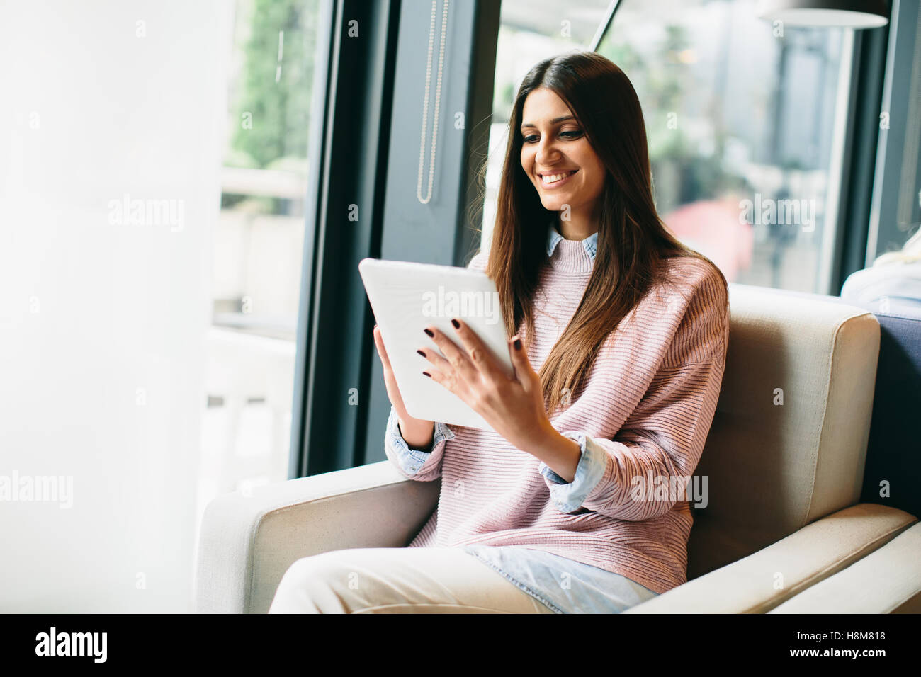 Woman in a cafe with tablet hi-res stock photography and images - Alamy