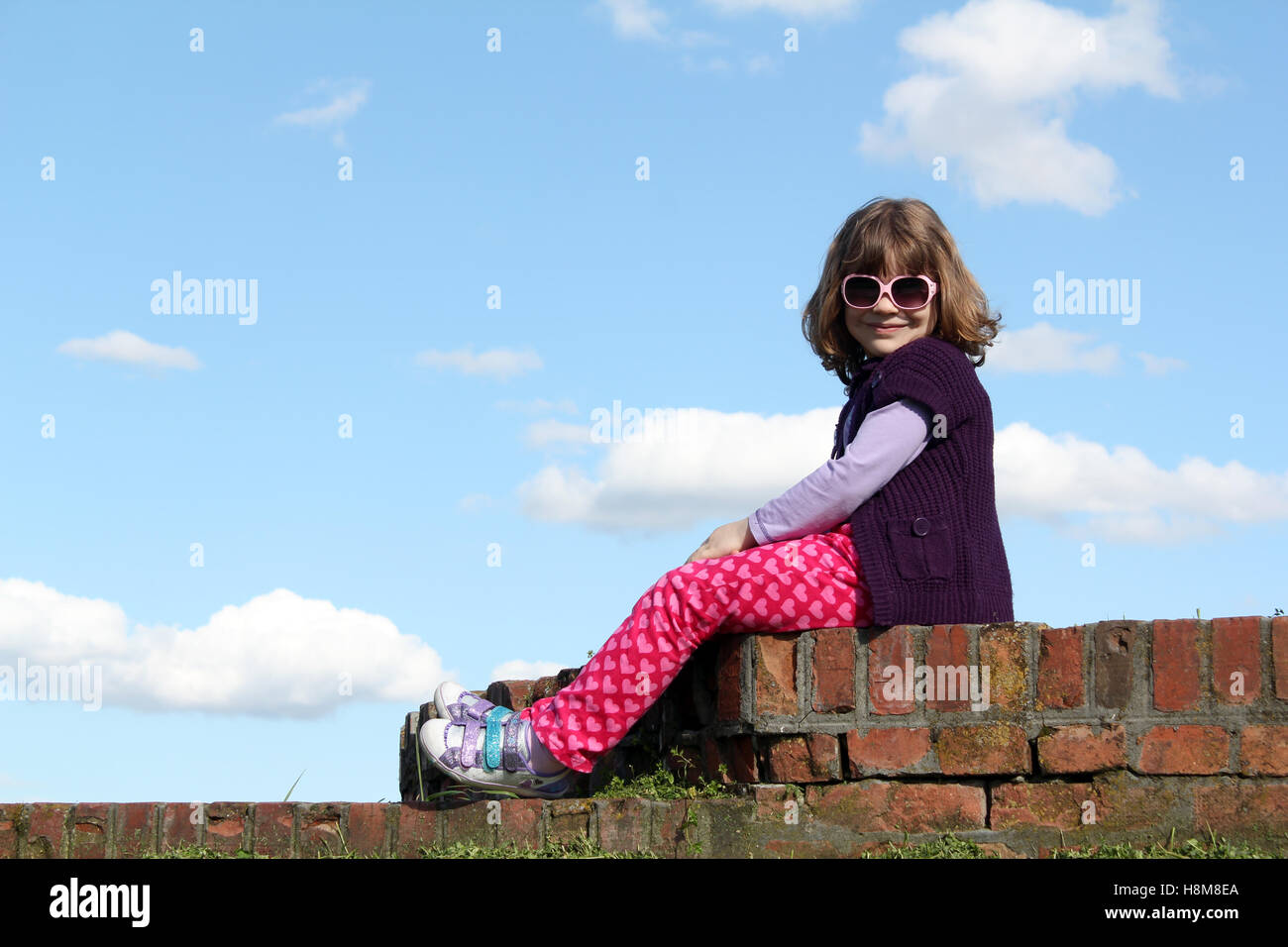 cute little girl with sunglasses Stock Photo