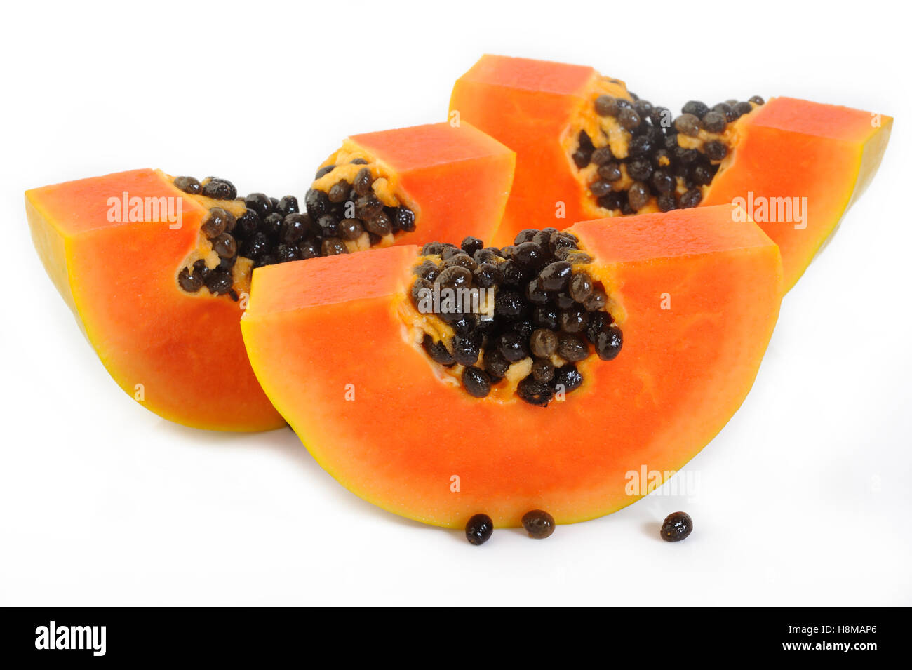 sliced papaya on white background Stock Photo