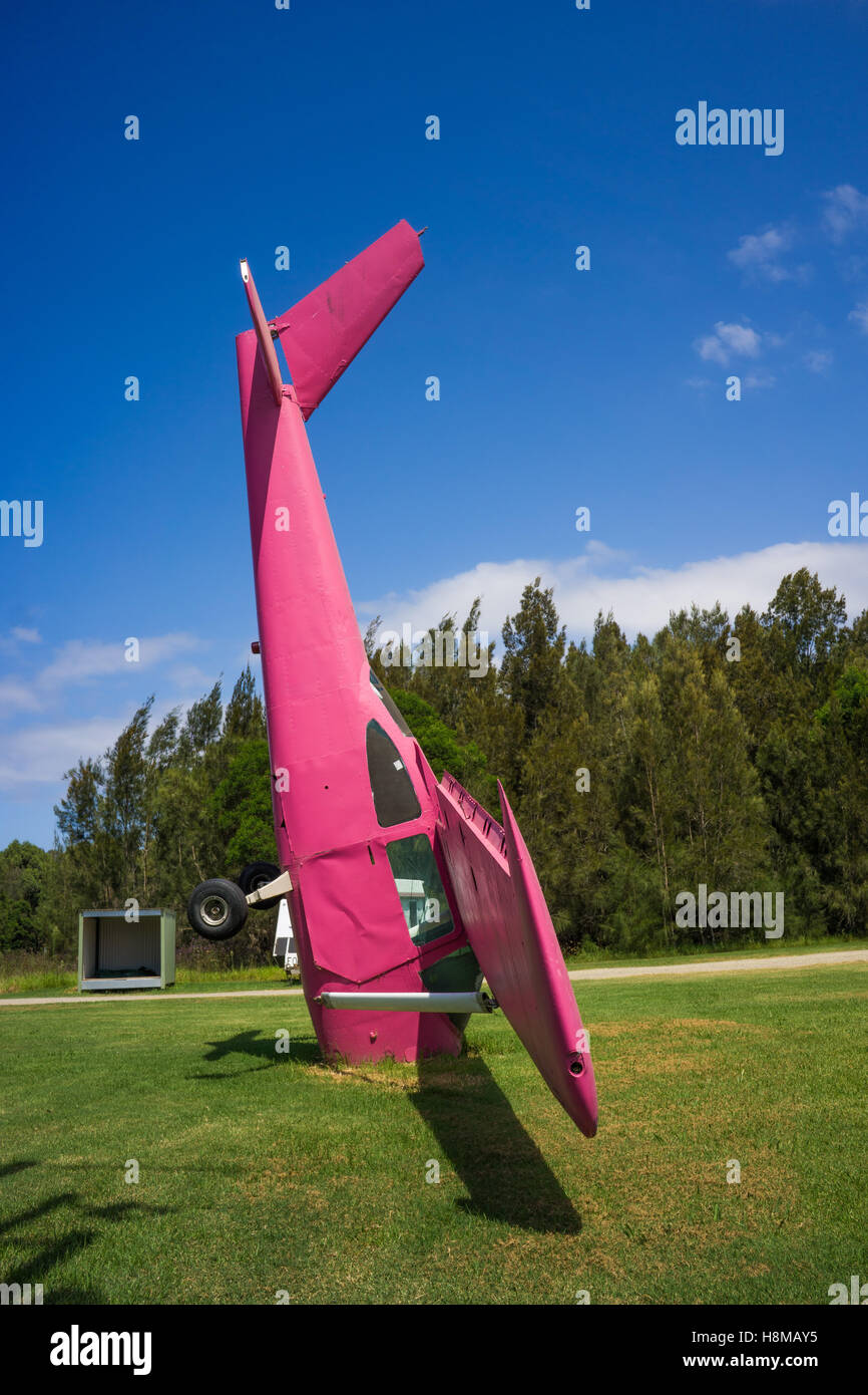 An old light aircraft sculpture at a remote service station in Australia Stock Photo