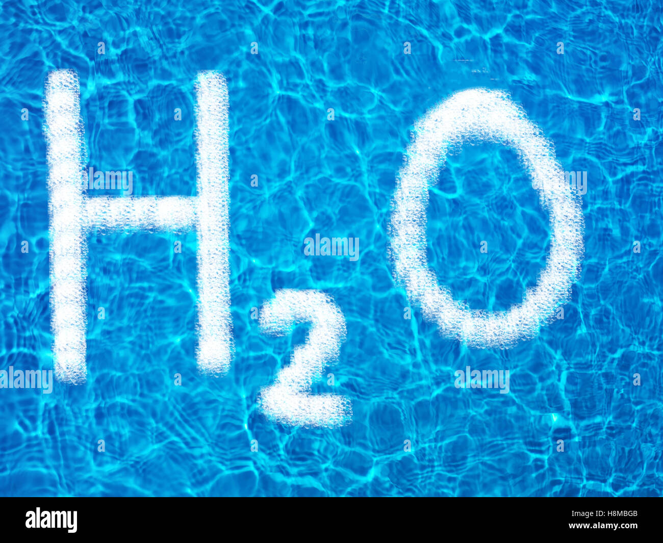 H2O on water Stock Photo