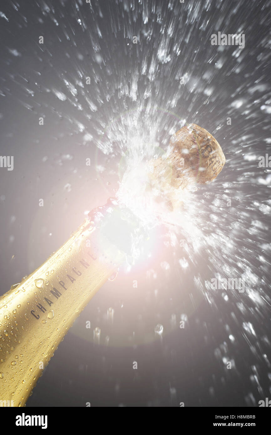 Champagne cork popping Stock Photo