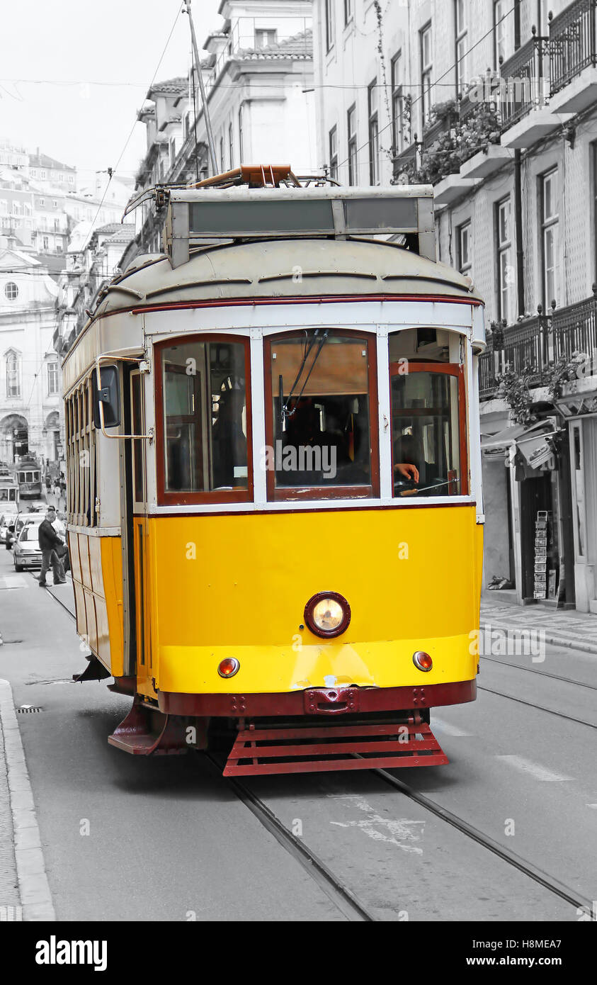 Old yellow tram in Lisbon, Portugal Stock Photo