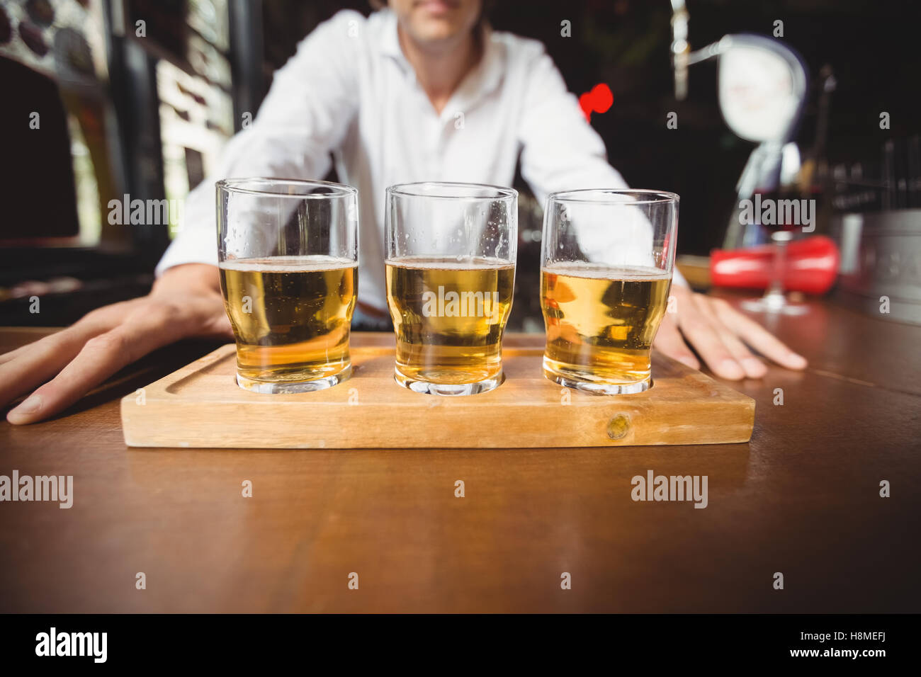Bartender leaning on counter hi-res stock photography and images - Alamy