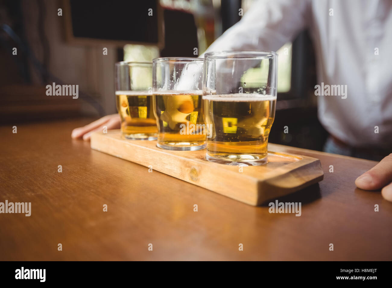 Bartender leaning on counter hi-res stock photography and images - Alamy