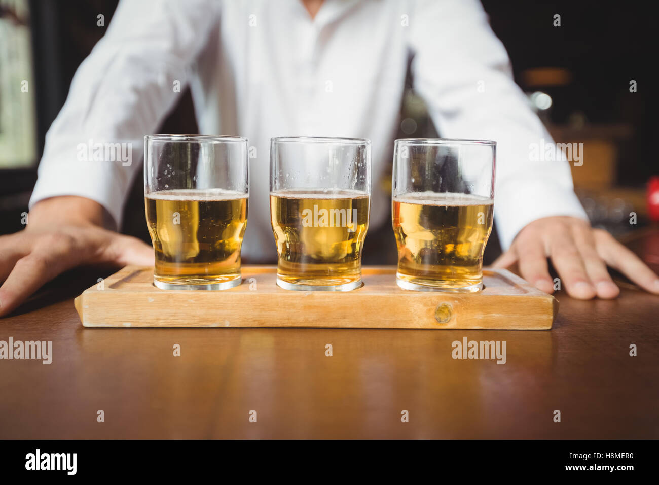 Close-up of beer glasses on the bar counter Stock Photo
