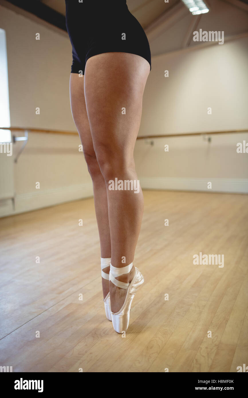 Ballerinas feet performing tiptoe Stock Photo