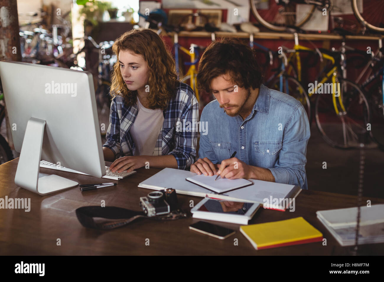 Mechanics working on personal computer Stock Photo