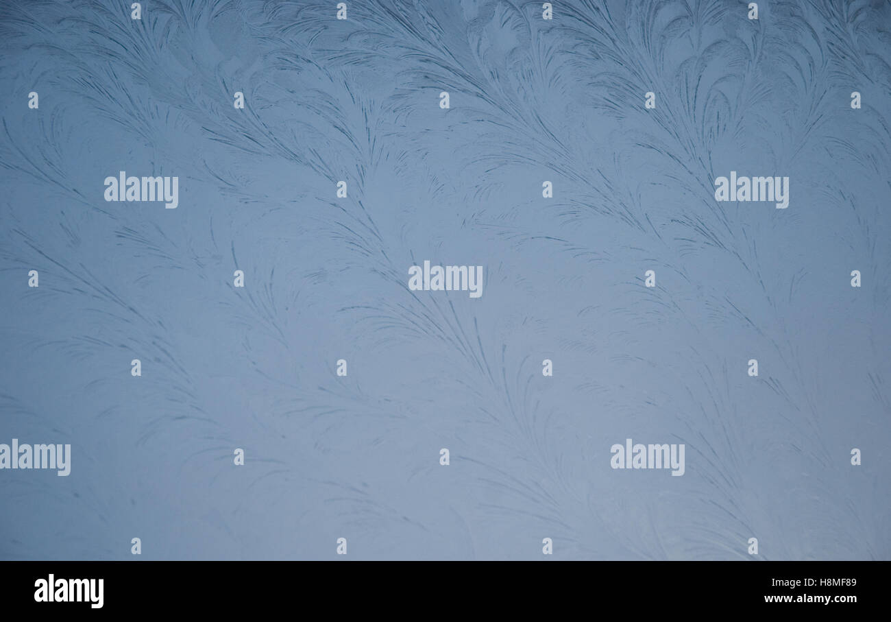 Frost patterns on the window Stock Photo - Alamy