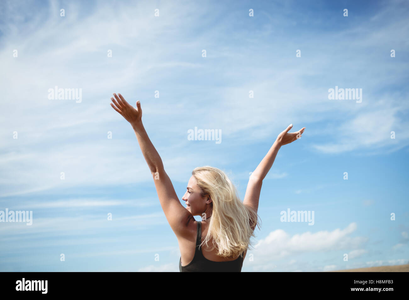 Woman raised hand rear hi-res stock photography and images - Alamy