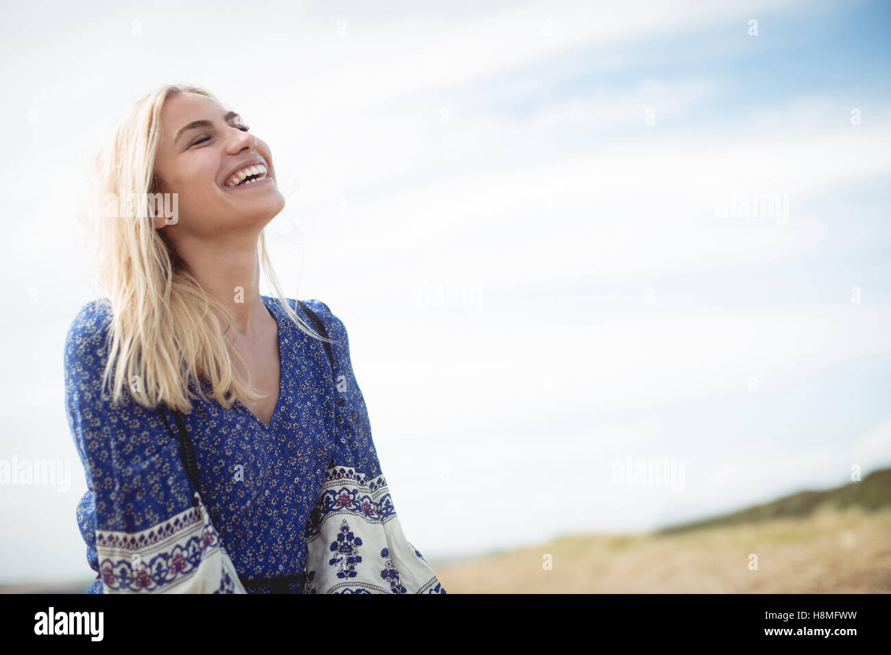 Young blonde woman laughing hi-res stock photography and images - Alamy