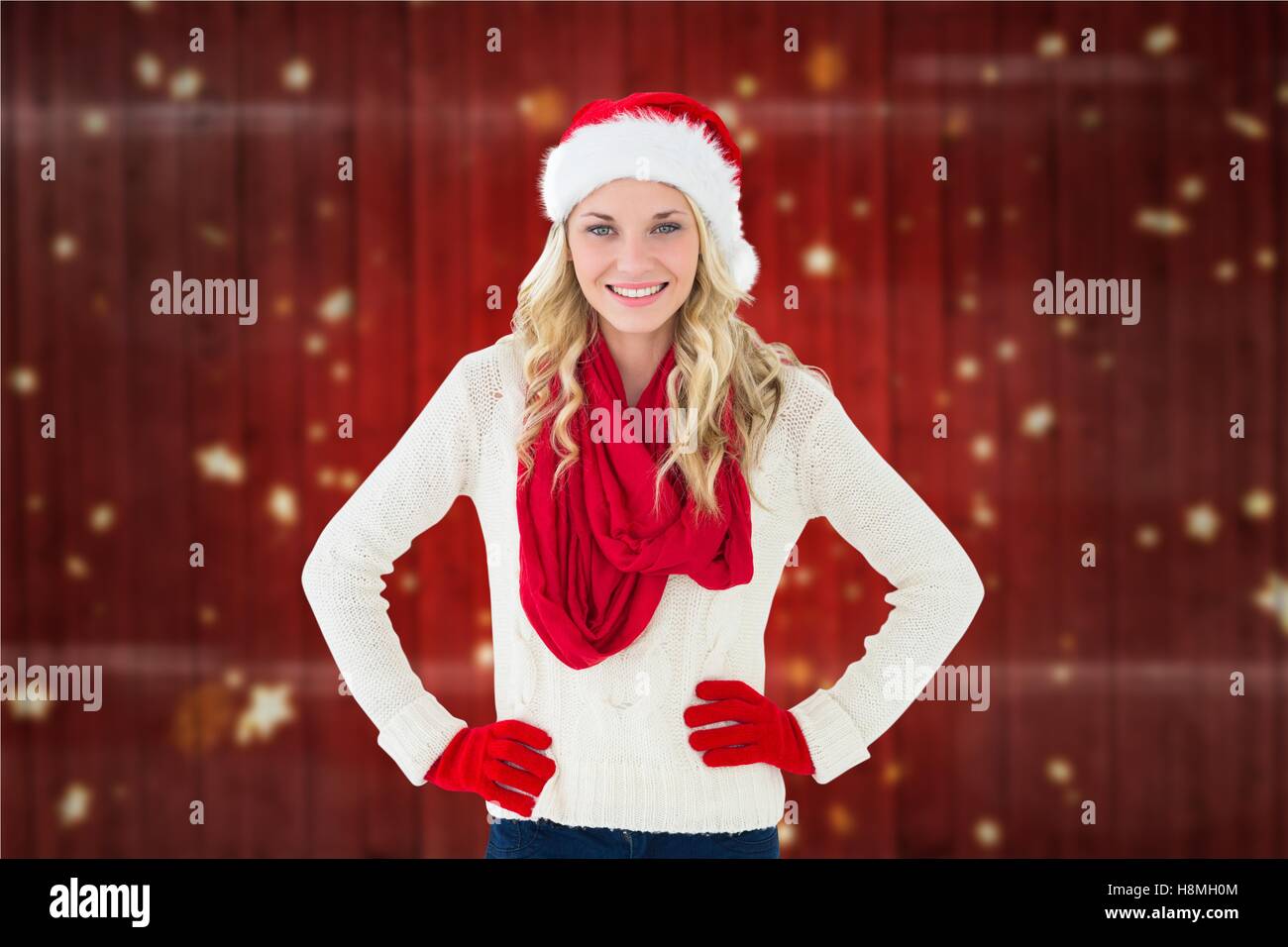 Portrait of smiling woman in santa hat Stock Photo