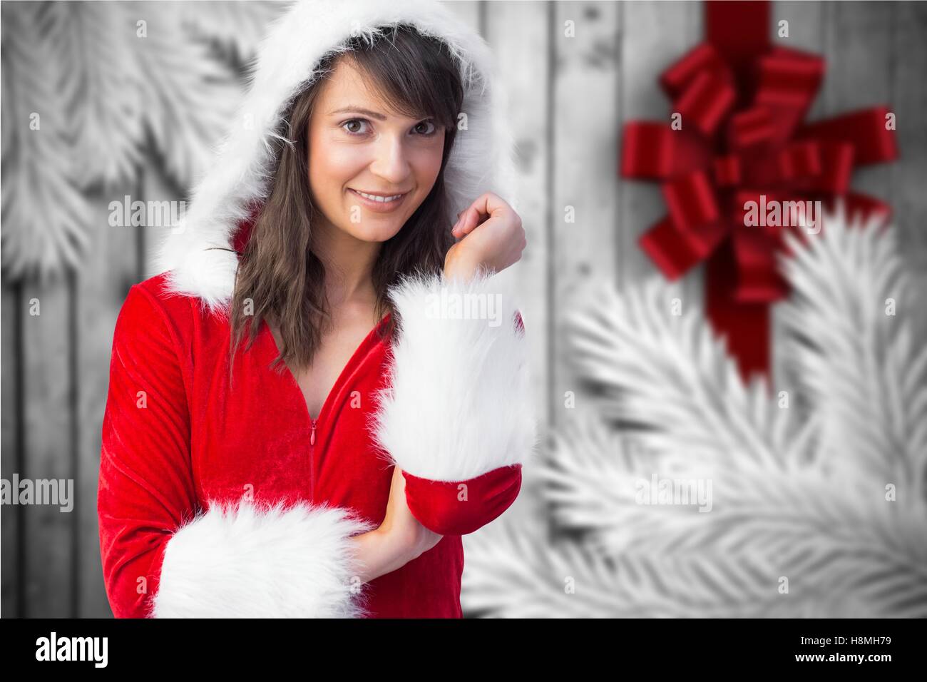 Portrait of smiling woman in santa costume Stock Photo