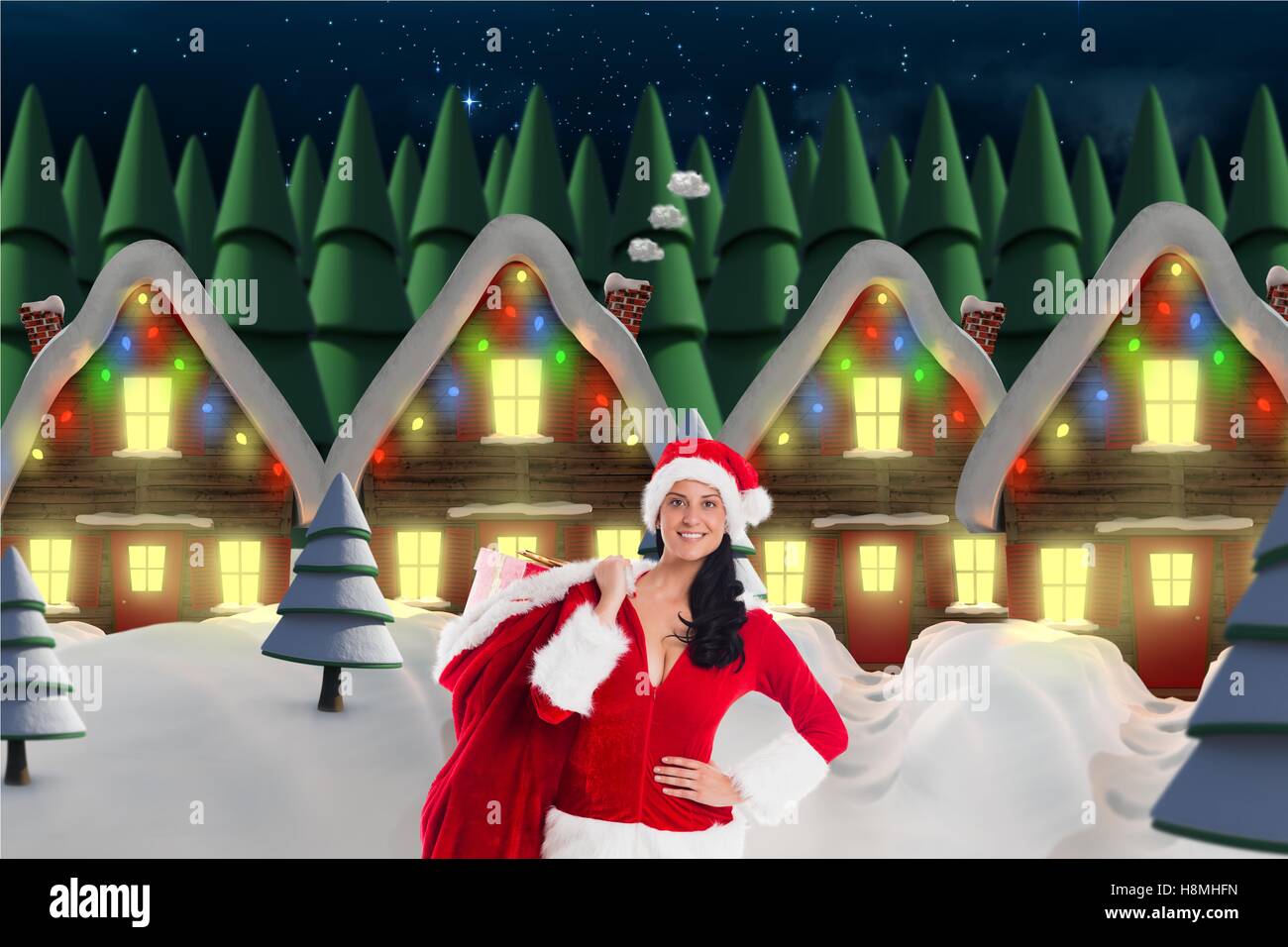 Beautiful woman in santa costume holding sack of christmas gift Stock ...
