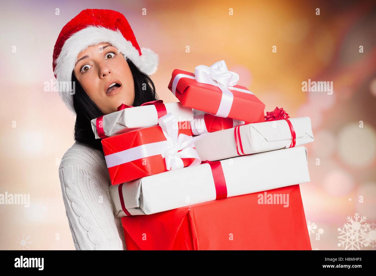 Tired woman holding gift boxes Stock Photo