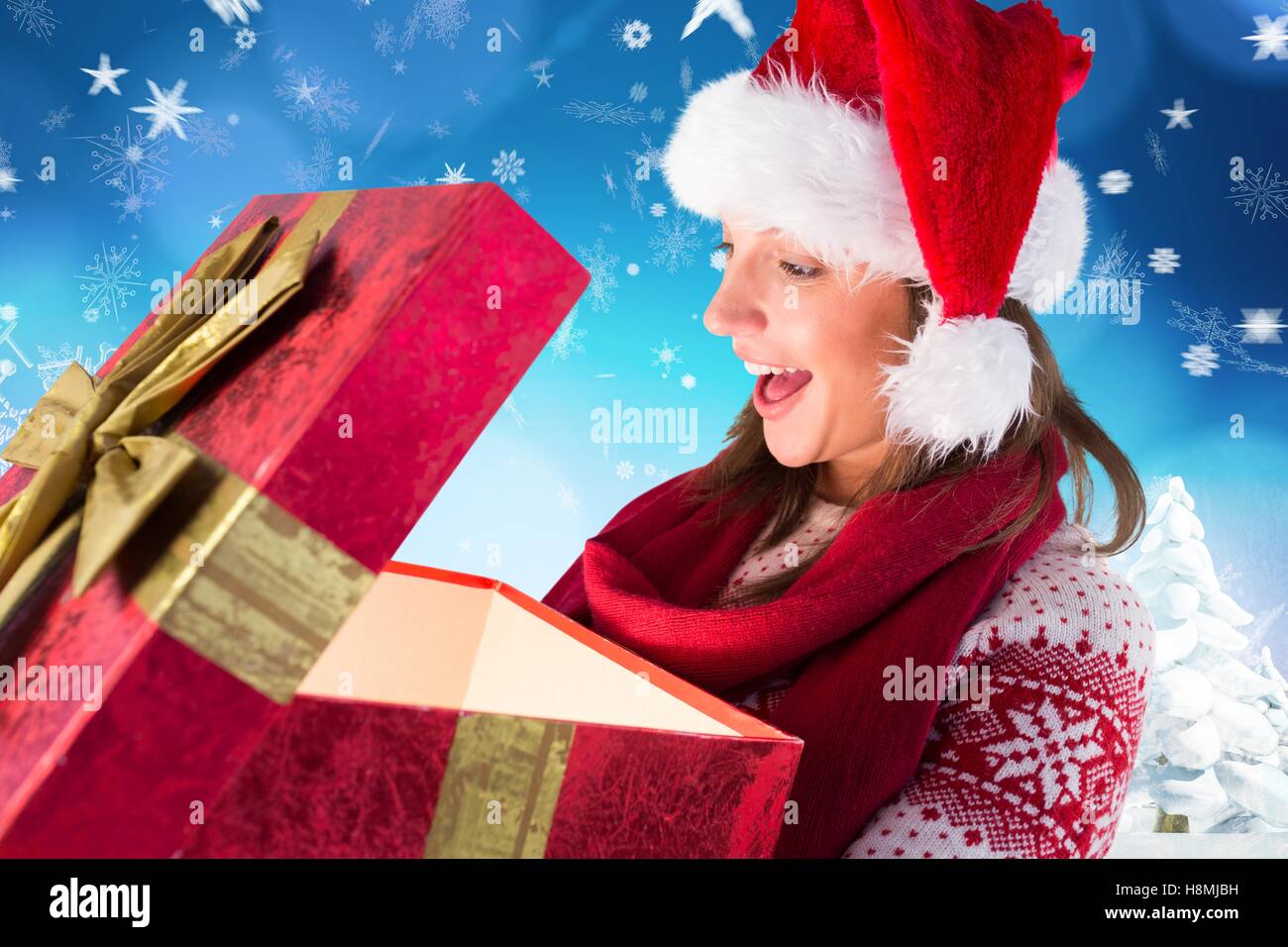 Surprised woman in santa hat hi-res stock photography and images - Alamy