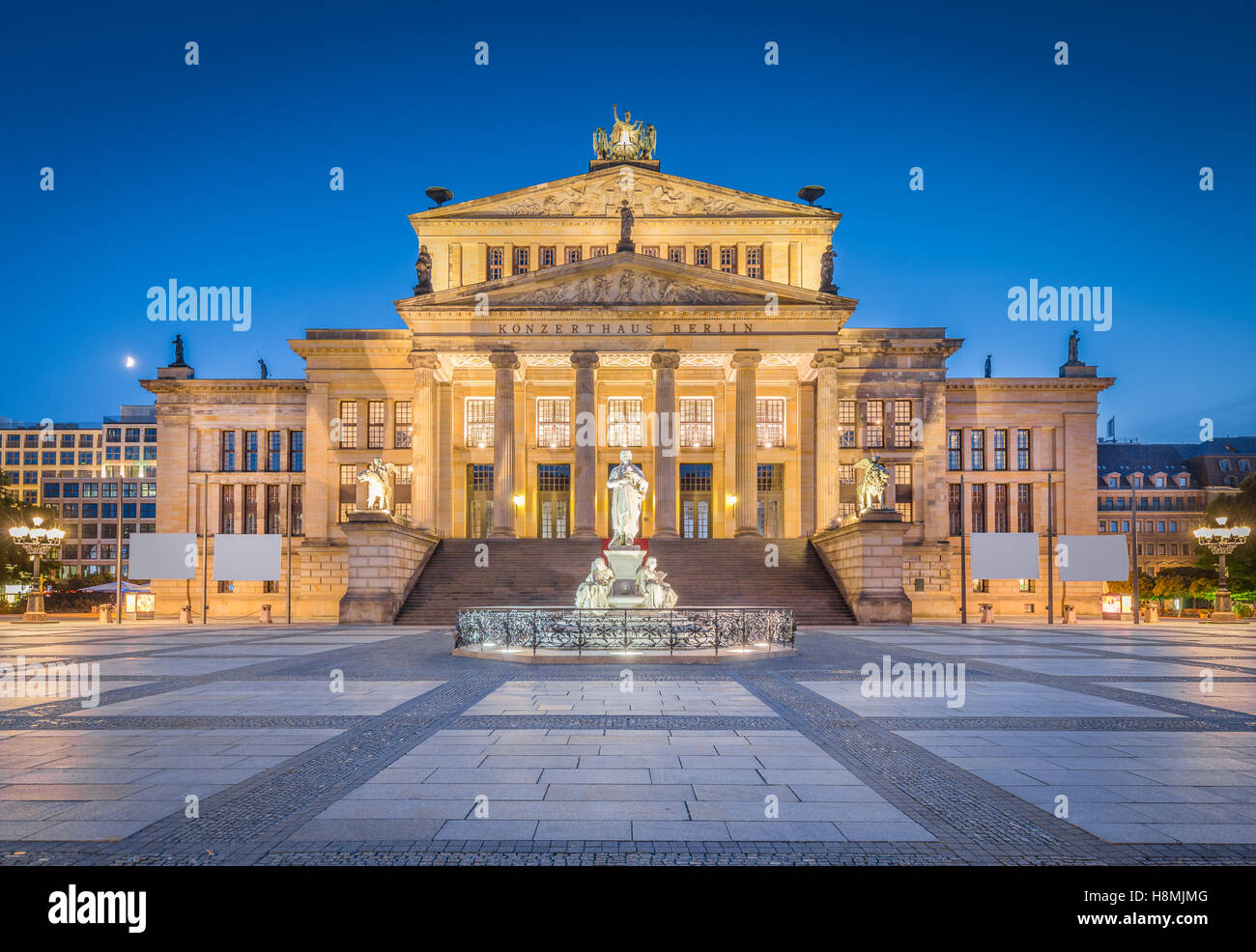 Classic view of historic Berlin Concert Hall at famous Gendarmenmarkt Square in beautiful twilight at dusk, Berlin, Germany Stock Photo