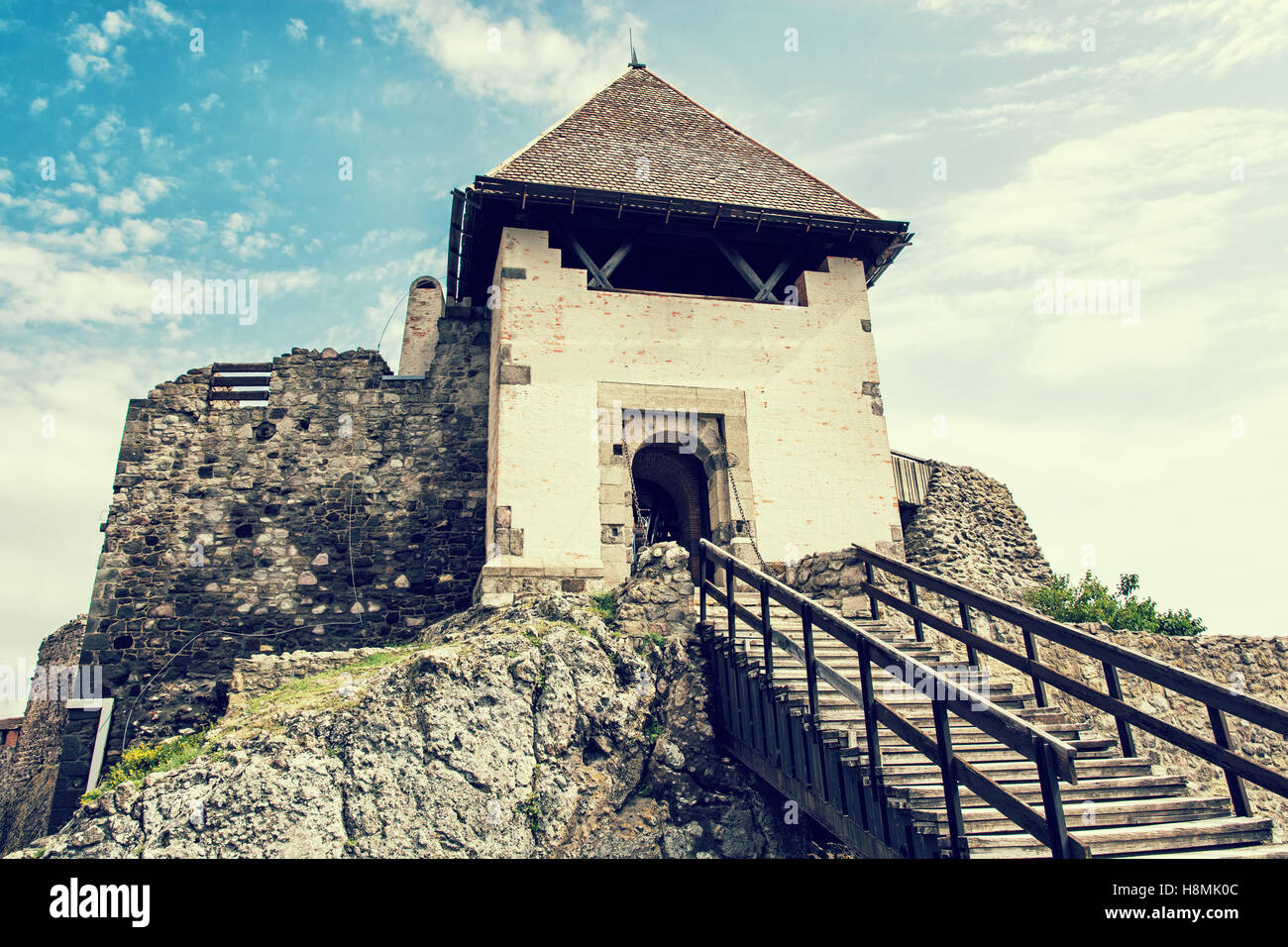 Ruin castle of Visegrad, Hungary. Ancient architecture with stairs. Travel destination. Cultural heritage. Retro photo filter. Stock Photo