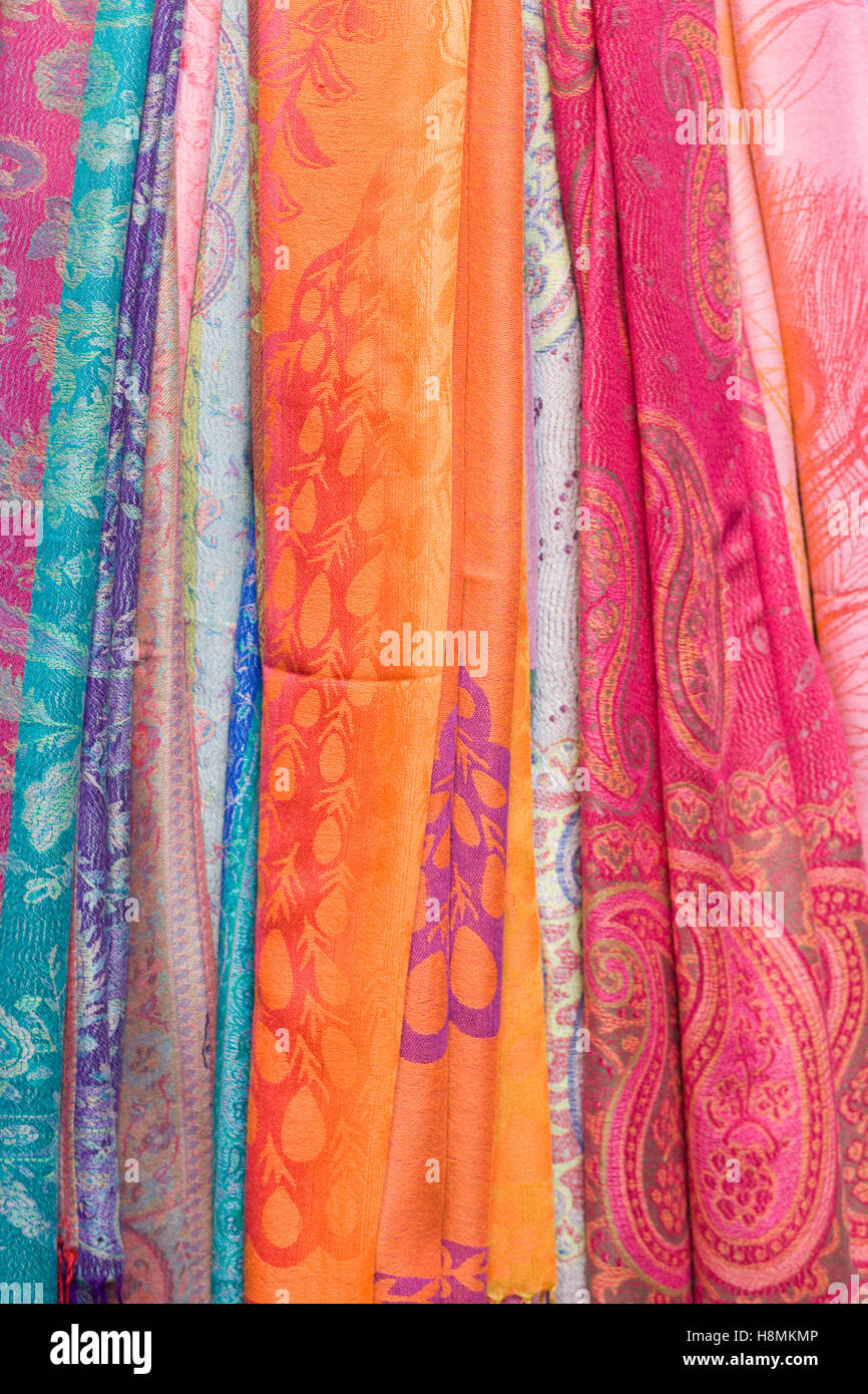 Colourful ethnic decorated shawls and scarfs Stock Photo