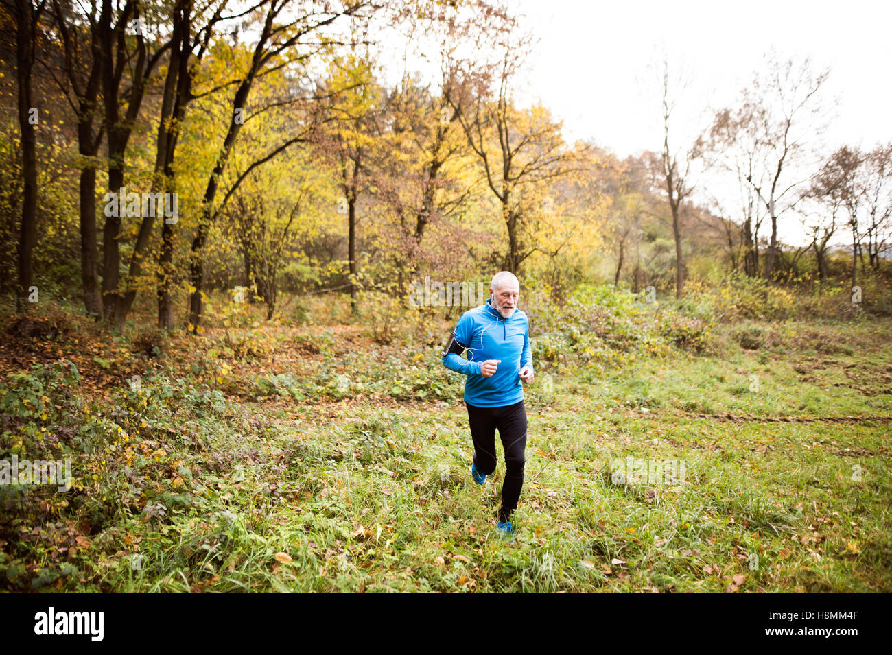 Old man running hi-res stock photography and images - Alamy
