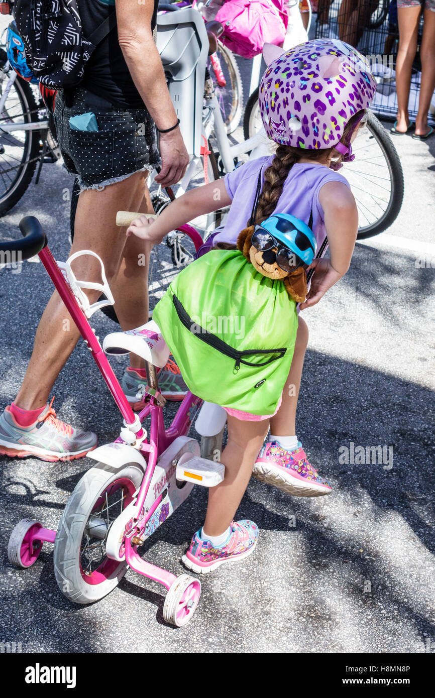 Miami Beach Florida,girl girls,youngster youngsters youth youths female kid kids child children,bicycle bicycles bicycling riding biking rider riders Stock Photo