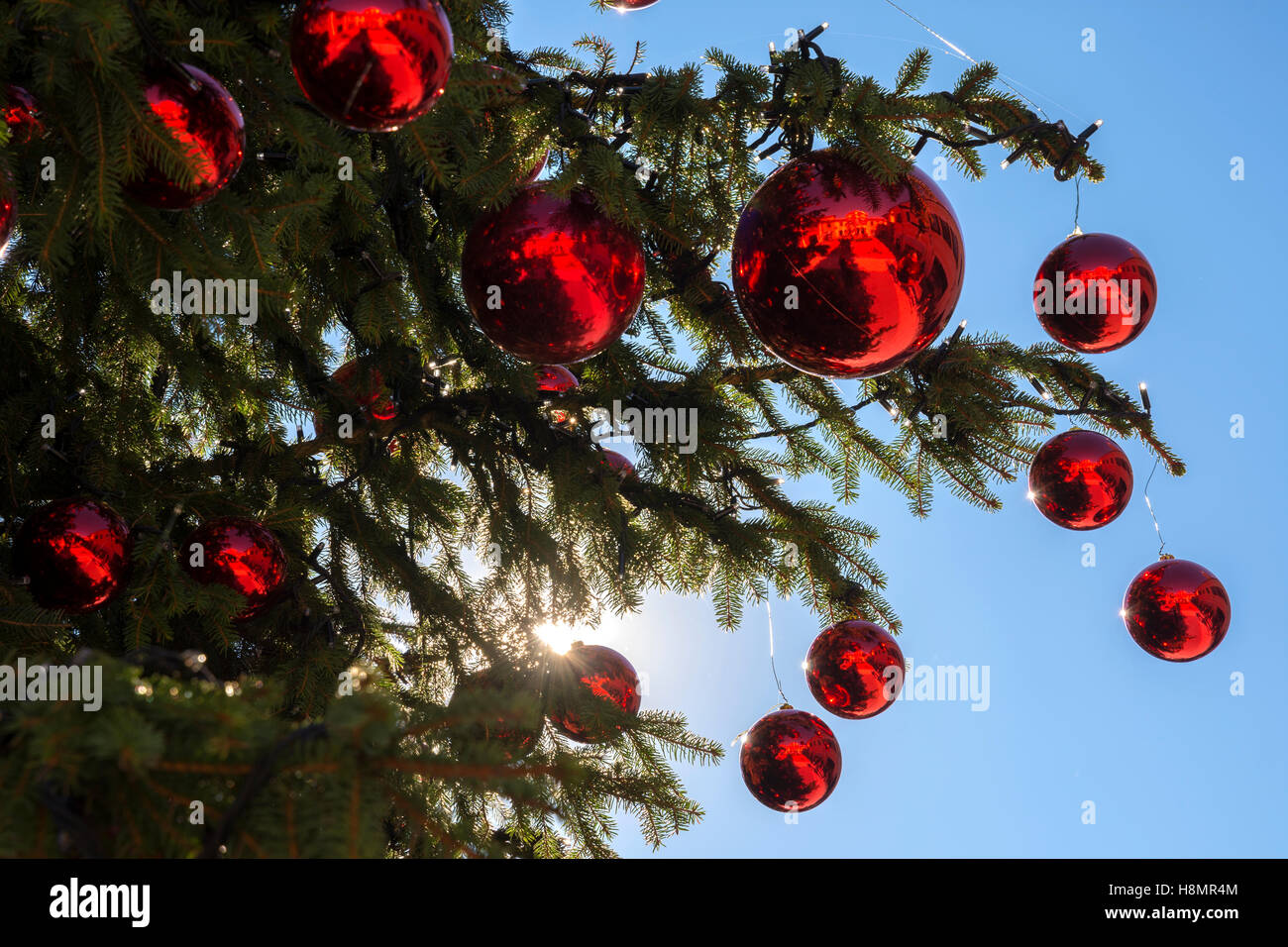 Christmas tree decorated with red balls Stock Photo - Alamy