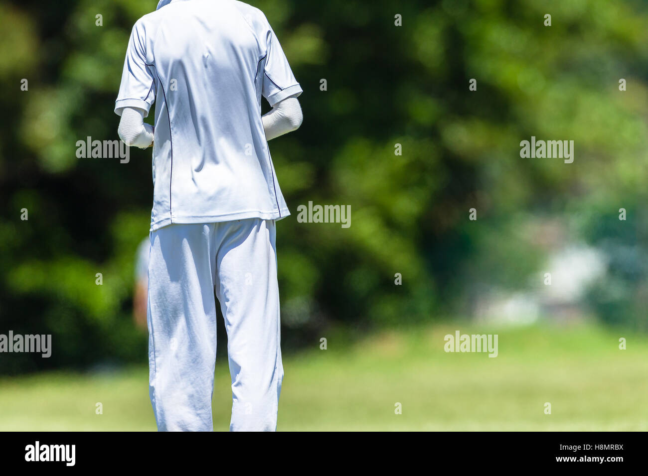 Cricket game teenagers high schools closeup unidentified abstract
