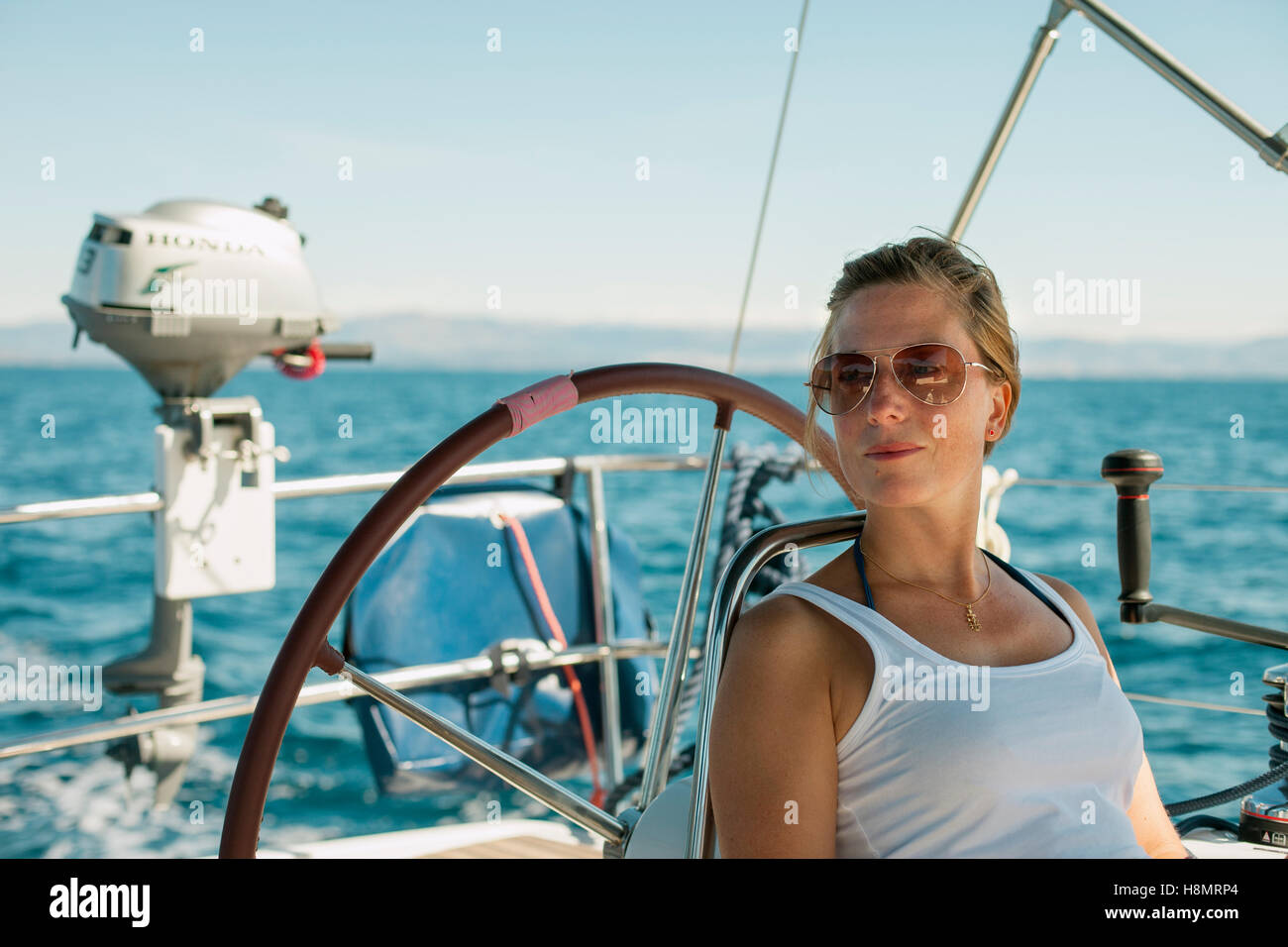 Woman wheel boat hi-res stock photography and images - Alamy