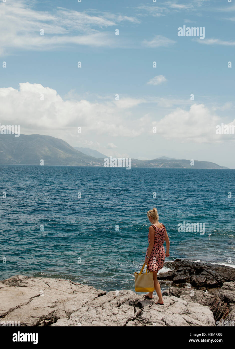 Blonde woman rear view dress hi-res stock photography and images - Alamy