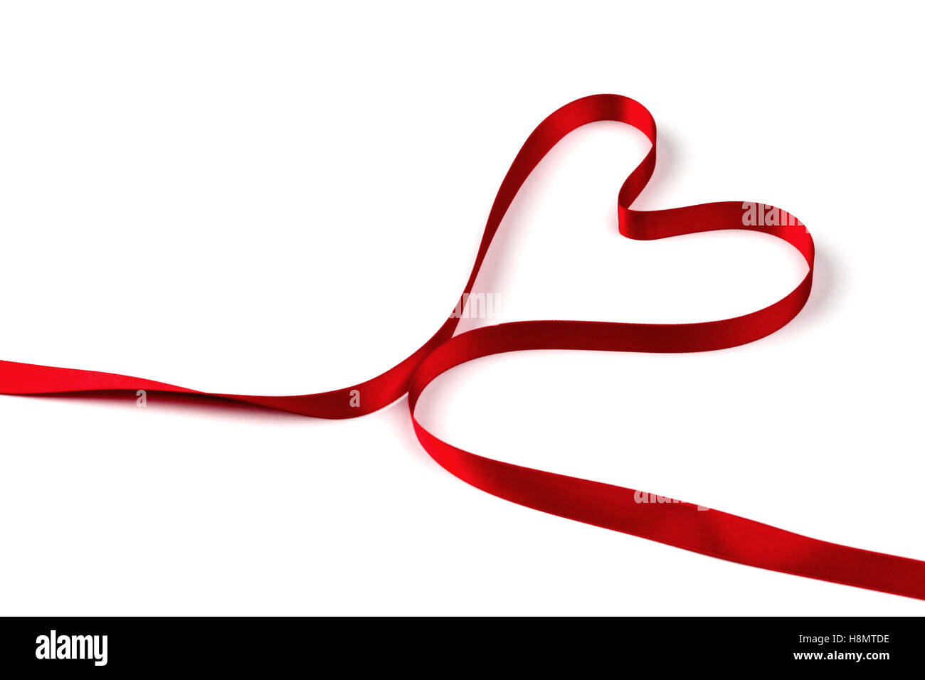 Heart from red ribbon isolated on white background Stock Photo - Alamy