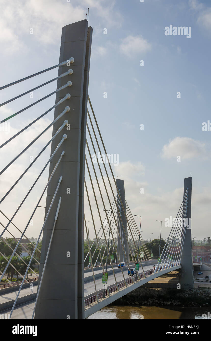 Modern bridge spanning a brown river in Lobito, Angola. Stock Photo