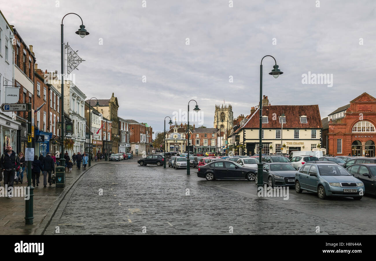 Beverley centre with view of car park, shops, St Marys Church, and the bandstand on an overcast day in autumn. Stock Photo