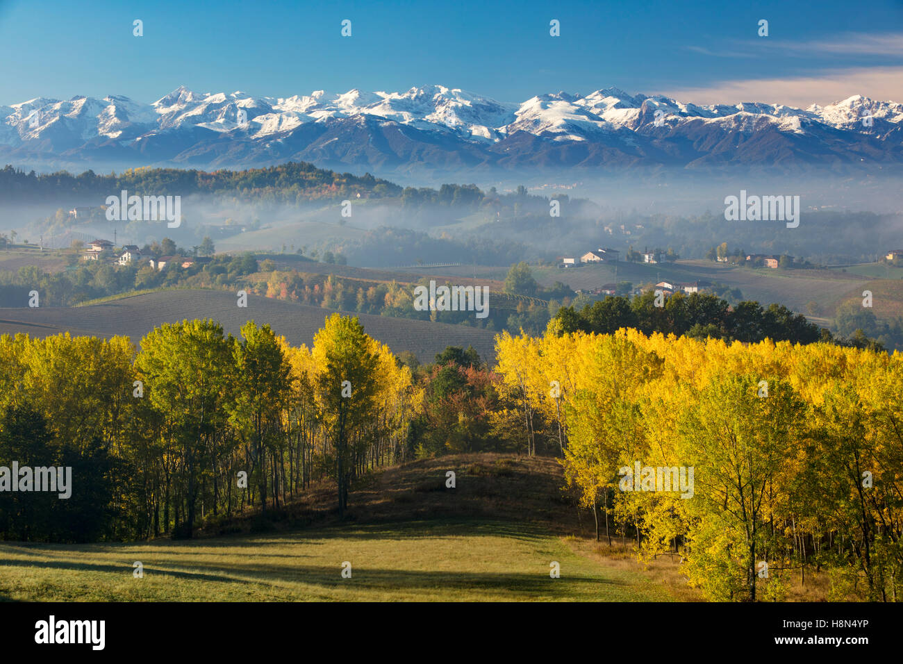 Autumn view across the Po Valley to the Ligurian Alps near Monforte d'Alba, Piemonte, Italy Stock Photo