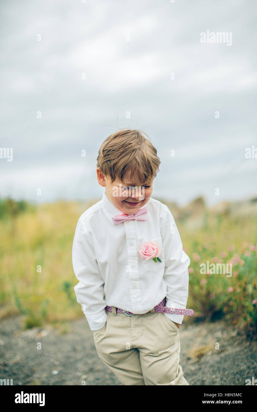 Well dressed boy (6-7) smiling Stock Photo