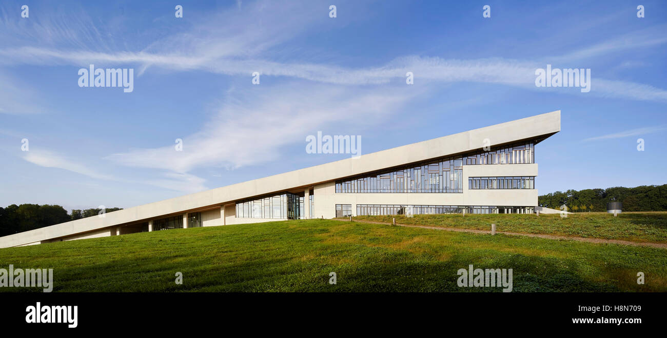 Side elevation with wedge-like shape of building. Moesgaard Museum, Aarhus, Denmark. Architect: Henning Larsen, 2015. Stock Photo