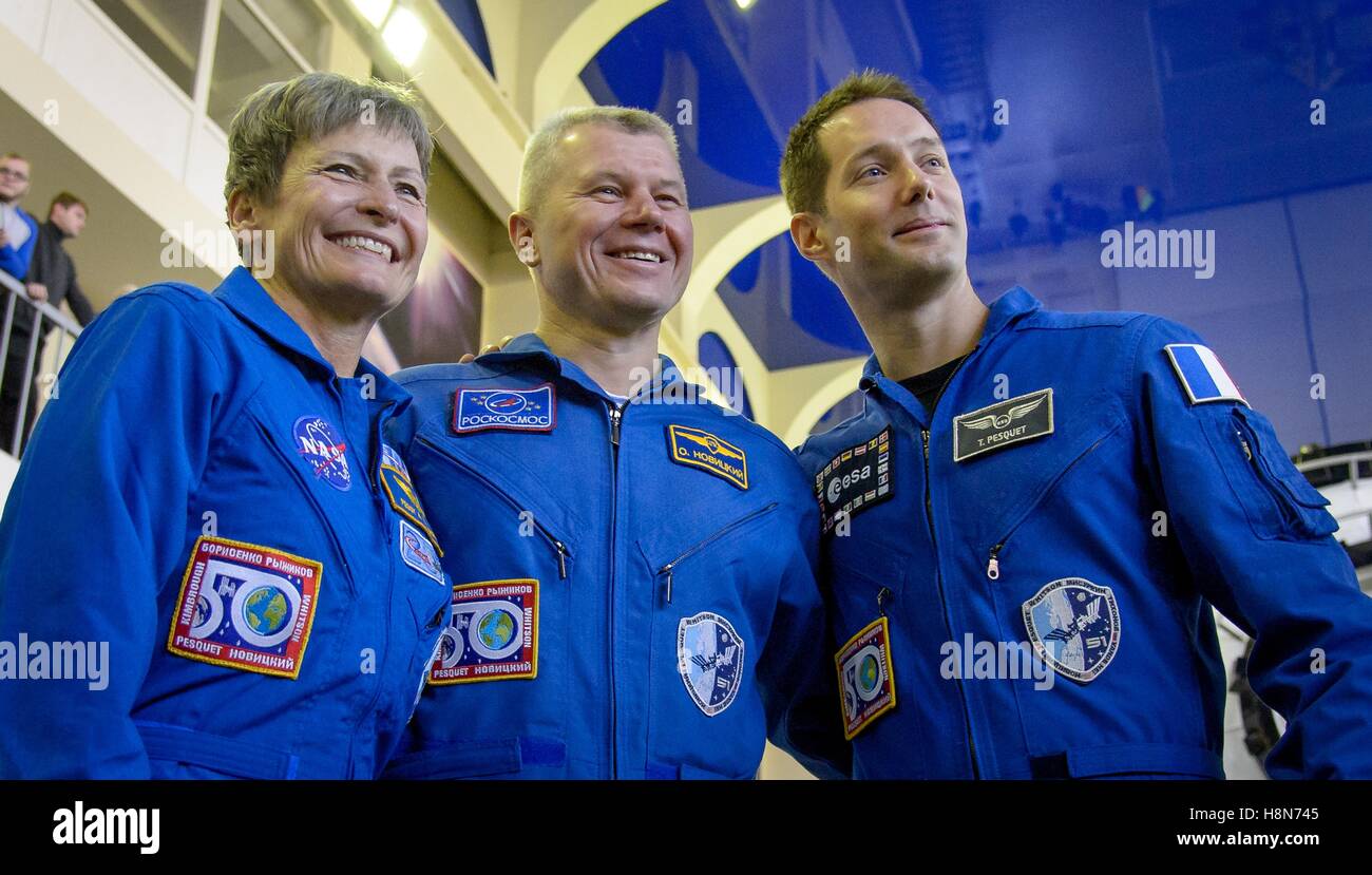 NASA International Space Station Expedition 50 prime crew members American astronaut Peggy Whitson (left), Russian cosmonaut Oleg Novitskiy of Roscosmos, and French astronaut Thomas Pesquet of the European Space Agency prepare for their Soyuz qualification exams at the Gagarin Cosmonaut Training Center October 24, 2016 in Star City, Russia. Stock Photo