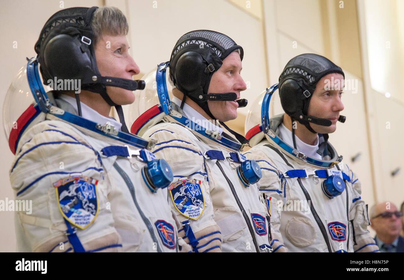 NASA International Space Station Expedition 50 Soyuz MS-03 prime crew members (L-R), American astronaut Peggy Whitson, Russian cosmonaut Oleg Novitskiy of Roscosmos, and Thomas Pesquet of the European Space Agency prepare for their qualification exams October 25, 2016 in Star City, Russia. Stock Photo