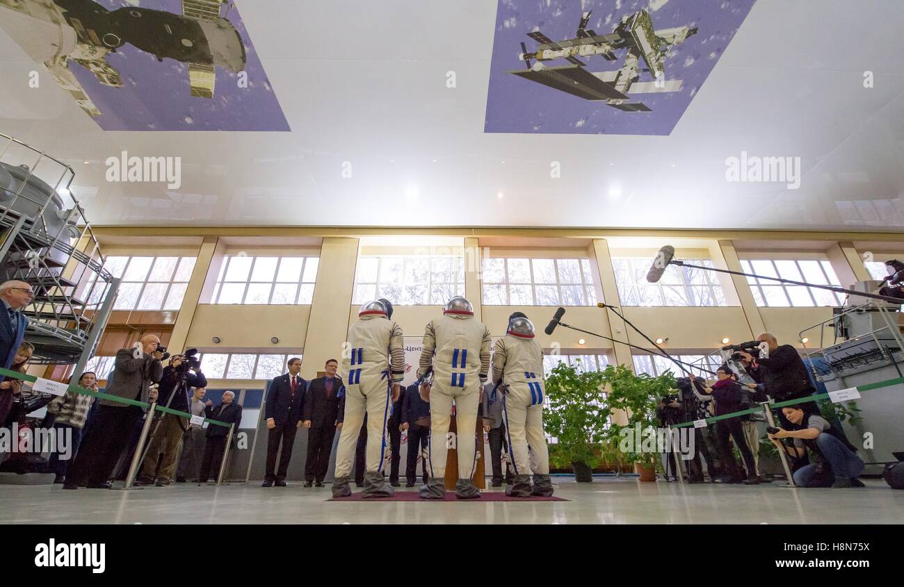 NASA International Space Station Expedition 50 Soyuz MS-03 prime crew astronauts (L-R), American astronaut Peggy Whitson, Russian cosmonaut Oleg Novitskiy of Roscosmos, and Thomas Pesquet of the European Space Agency prepare for their qualification exams October 25, 2016 in Star City, Russia. Stock Photo
