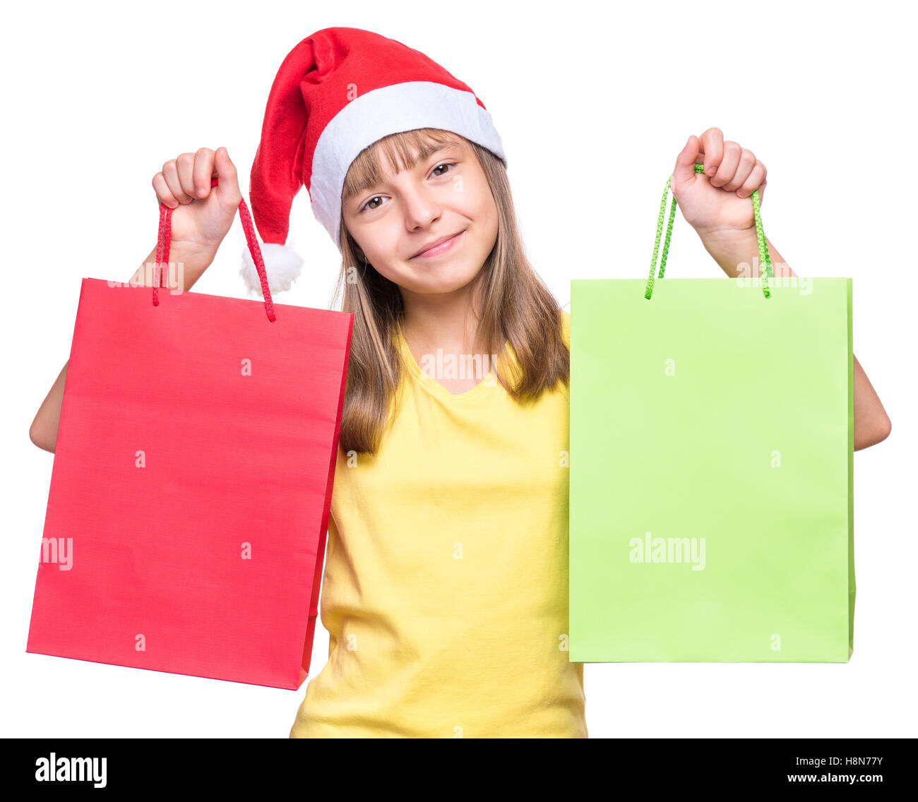 Cute girl wearing Santa Claus hat Stock Photo - Alamy