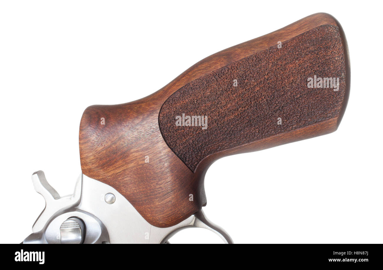 Wooden grip on a handgun isolated on white Stock Photo