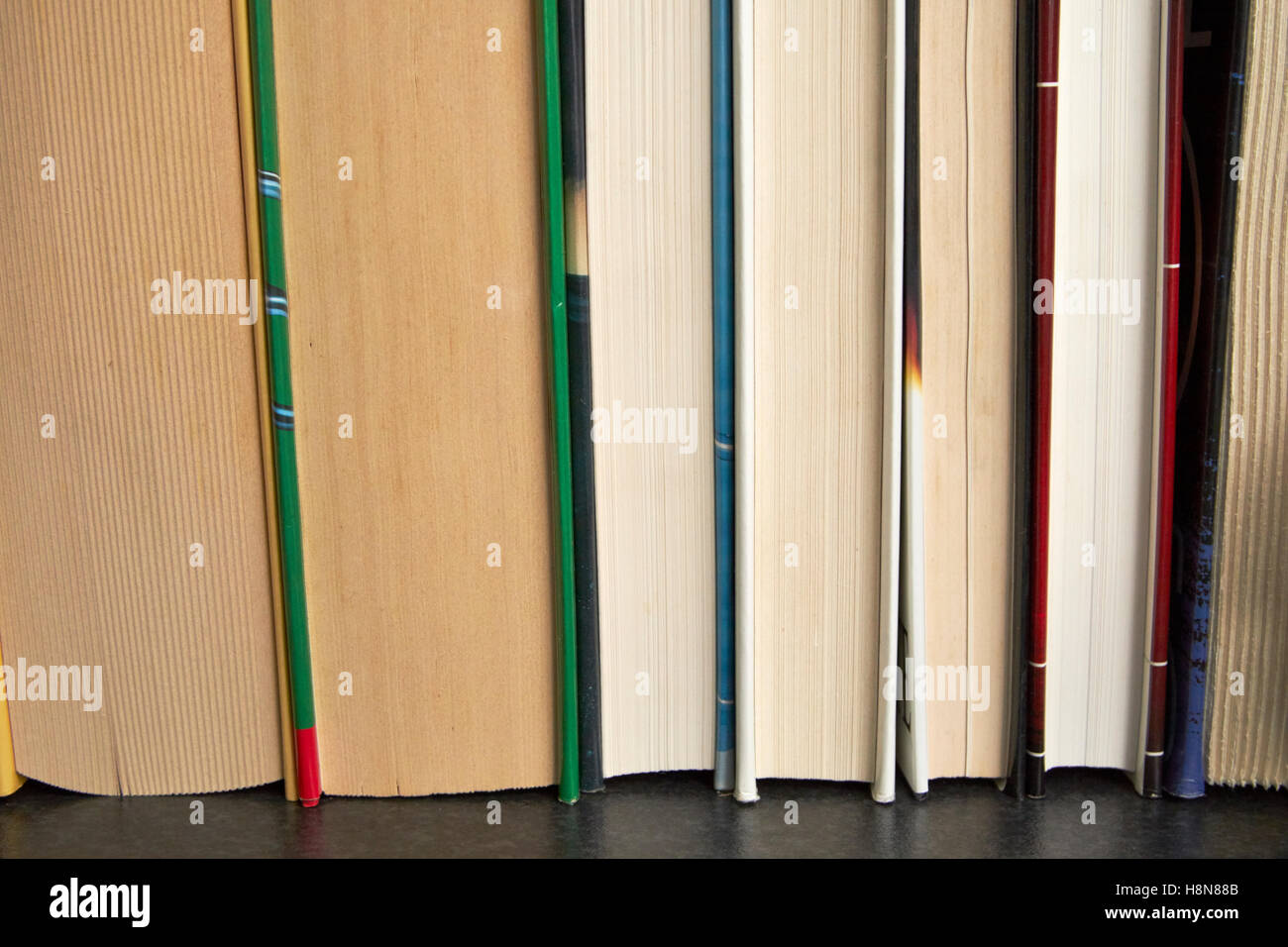 row of used hardback books in the uk Stock Photo
